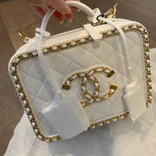 I found that for a light color bag, this bag's caviar leather is quite sturdy and as such because it's caviar it's less prone to color transfer. Chanel Bags Chanel Vanity Case Poshmark