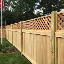 It's fun to build a fence. Cedar With Lattice Top Always A Great Privacy Fence Arrowfencecoinc Backyard Fences Fence With Lattice Top Front Yard Fence