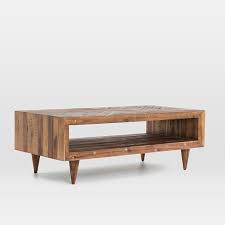 Style sparingly with coffee table books and candles so that the timeless design and craftsmanship can really shine through! Alexa Reclaimed Wood Coffee Table