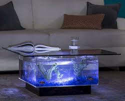 Desain aquarium unik yang cocok untuk dekorasi rumah. 7 Model Meja Aquarium Unik Ini Bikin Ruang Tamu Lebih Atraktif