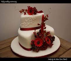 This dazzling stone's deep red hue is the perfect symbol of burning love that's lasted for 40 years. Ruby Wedding Anniversary Cake Autumnal 40th Wedding Anniversary Cake Wedding Anniversary Cakes Anniversary Cake