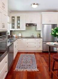 Stainless Counter Kitchen Design Ideas Pictures Remodel And Decor Types Of Kitchen Flooring Kitchen Design Grey Wood Floors Kitchen