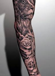 Arm Men Black And White Tattoos In 2020 Tattoos For Guys Men Flower Tattoo Lion Head Tattoos