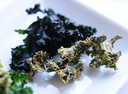 Raw Kale Chips Made With Purple Red Kale Grind Up Raw Cashews In A Food Processor Add Oil Nutritional Yeast And Spice Raw Food Recipes Raw Snacks Kale Chips