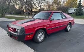 Image result for Black 1984 Plymouth