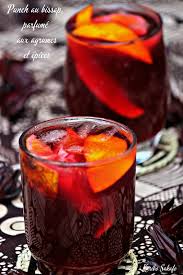 Punch Au Bissap Parfume Aux Agrumes Et Epices Karibo Sakafo Bissap Recette Punch Boisson