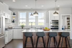 Quartz is made to be exceptionally durable and hardwearing due to the composite of crushed quartz and resin. Blog 4 Kitchens With White Cabinets And A Wood Island