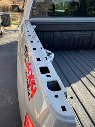 Toyota tundra side steps and bed racks, for example, enable you to maximize your truck's construction and improve its utility. Installing Diamondback Hd Bed Cover Pre Step 1 Remove Bed Rail Caps And Place Adhesive Rubber Shims On The Corresponding Underside Area Of The Bed Rail Caps Where The Center Member Of