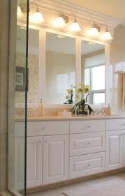 When it comes to vanity light height, how high do i hang my vanity lights? Jrl Interiors The Right Height To Hang Light Fixtures Bathroom Trends Elegant Bathroom Small Bathroom Decor