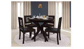Including four chairs around a sturdy table, the east west furniture boston 5 piece round dining table set with dover wooden seat chairs is the perfect set for every kitchen. Round Dining Tables The Ideal Dining Style For Small Spaces Most Searched Products Times Of India