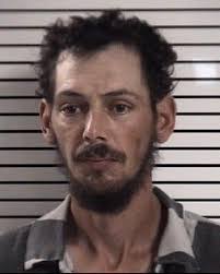 Iredell man charged after pills, firearm found