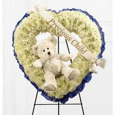 Which flowers mean love, hope, healing, and good luck? Most Beautiful Child Funeral Flowers For Your Beloved Baby Funeral Flowers Funeral Flower Arrangements Casket Flowers