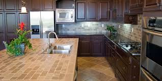 When designing or remodeling your kitchen , one of the most important elements you'll need to consider is the surface material for your kitchen island and countertops. Tiled Kitchen Worktops Pros Cons Tile Mountain