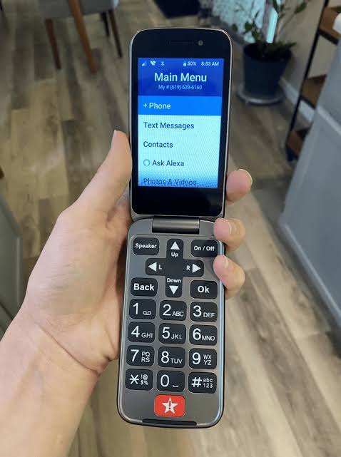 4G flip phone featuring large backlit keypad, AI generated