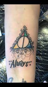 My Harry Potter Deathly Hallows Tattoo Love It Saw This Design In Black And White But Knew I Wanted Some Colou Tattoos Always Tattoo Deathly Hallows Tattoo