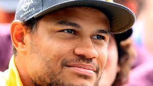 Hoffman says he's 'going nowhere'