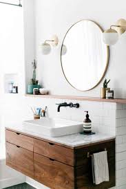 What i really love about bathroom vanities with the option of a vessel sink is that you can be really creative because the bathroom vanities themselves, what's really important, especially if you buy a piece like this that's got the base cabinet and the countertop is that it's already cut for a vessel sink. Let S Talk Vessel Sinks Wall Mount Faucets Emily Henderson