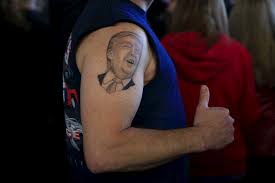 Har prakash rishi shows tattoos of queen elizabeth ii, us president barrack obama and indian prime minister narendra modi while posing for a photo on. Ohio Man Has Donald Trump Tattooed On His Arm Cbs News