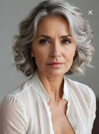 Who can recommend a good hair stylist in Hendersonville, NC for natural  gray hair and a specific cut?