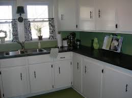 Remodel your kitchen quickly and easily by cutting out old wooden door panels and installing new, striking materials, like metal, glass or fabric. Hop On In The Back Door Cottage At The Crossroads