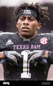 Texas A&M's defensive back DeVante Harris (1) crosses his heart after  saying prayer before an NCAA