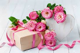 Check spelling or type a new query. Rose Flowers Wooden Heart And Gift Box On Blue Rustic Table Beautiful Greeting Card For Birthday Woman Or Mothers Day Pastel Color Stock Photo Picture And Royalty Free Image Image 92147943