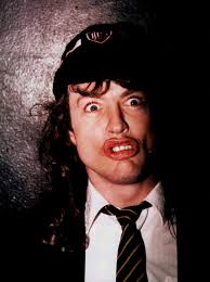Angus Young Turns Neck Tie Into Guitar Pick 🎸 "