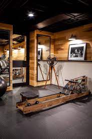 It is much more masculine and industrial than my usual aesthetic but the industrial vibe is perfect for the unfinished basement space. Perfect Blend Of A Modern Industrial Sleek Cabin Look With A Little Modern Farmhouse Flair Home Gym Decor Gym Room At Home At Home Gym