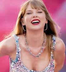 Describe Taylor Swift in 3 words?