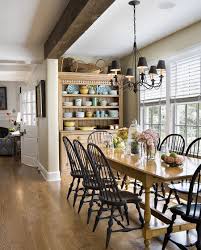 It is a dark finish,counter height table w/ ladder back chairs & a buffet & hutch. 30 Delightful Dining Room Hutches And China Cabinets