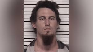 Man charged with kidnapping after woman, baby found hiding in woods