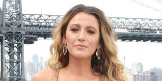 Blake Lively Makes Golden Appearance at Michael Kors' NYFW Show