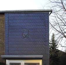 Schiefer Fassadenverkleidung Mit Eulenornament Von Dirk Walter Bongartz Dachdeckermeister In Dusseldorf 40595 Dachde Dachdecker Fassadenverkleidung Fassade