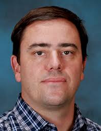 Atom-by-atom fabrication by electron beam via induced phase transformations 