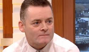Buckingham Palace: Guardsmen in skirts march to the parade