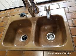 Tighten the nut splitter with a wrench until the lock nut splits and falls off. Strainer Basket Stuck Terry Love Plumbing Advice Remodel Diy Professional Forum