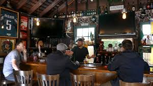Garage bar idea for the hubby's man cave. These N J Neighbors All Turned Their Garages Into Bars And It S Awesome Nj Com