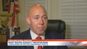 Republican, veteran and gun rights supporter Brian Mast says assault  weapons should be banned