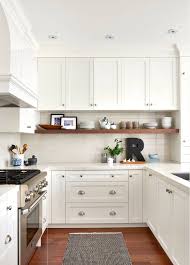 A Mixture Of Cabinets And A Floating Shelf Is An Awesome Combination We Love It Kitchen Layout White Shaker Kitchen Kitchen Renovation
