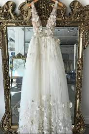We have the most latest arrival with the most fashionable and elegant styles. A Line 3d Flowers Deep V Neck Ivory Straps Wedding Dresses Simple Boho Cathyprom