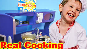 Kids pretend play toy kitchen accessories set, cooking toys stainless steel pots and pans sets w/ rack, utensils w/ holder, apron, glove & mat, cutting play food w/ basket for kids girls boys toddlers. Its Real Childrens Cooking Play Kitchen Set Toys Kid Lets Cook Food At H Childrens Play Kitchen Toys For Boys Kids Playing