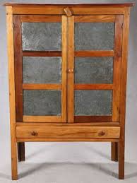 A pantry cabinet may fit nicely into the pie shaped corner of the kitchen. Antique Pie Safe Prices Guide Antiques Priceguide Kitchen Household America A Pie Safe Pie Safe Antique Pie Safe Primitive Farmhouse Decor