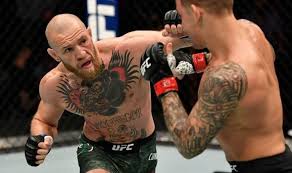 Dustin poirier throws a kick in his ufc 257 victory over conor mcgregor. Kswvssl9swe Am