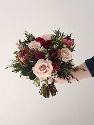 This bouquet features dahlias, roses. Hunter Valley Wedding Featuring Native Wedding Bouquet Of Protea Rose And Seasonal Blooms And Foli Flower Bouquet Wedding Fall Wedding Bouquets Floral Wedding