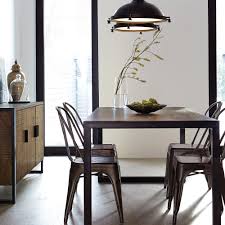 A sturdy dining room table could last generations if treated well, so it's an investment worth making. Atelier Industrial Chic Wood Dining Table With Metal Legs Chic Dining Room Metal Dining Chairs Home Decor