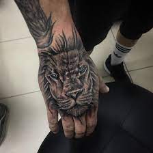 Rate This Angry Lion Tattoo 1 To 100 Lion Hand Tattoo Men Lion Hand Tattoo Lion Tattoo