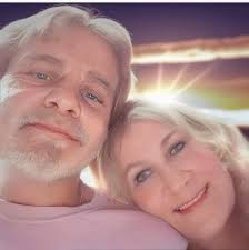 Can someone enhance this photo of my late husband and me?