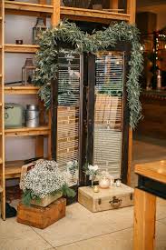 Window Frame Seating Chart With Vintage Trunks And Ivy