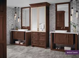 With Floor To Ceiling Linen Cabinets And Two Vanities This Bathroom Is Both Stylish And Spacious Kraftmaid Dream Bathrooms Kitchen And Bath Showroom