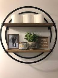 Metal Circle Double Wood Plank Wall Shelf Kirklands In 2020 Wall Shelf Decor Shelf Decor Living Room Round Wall Shelves